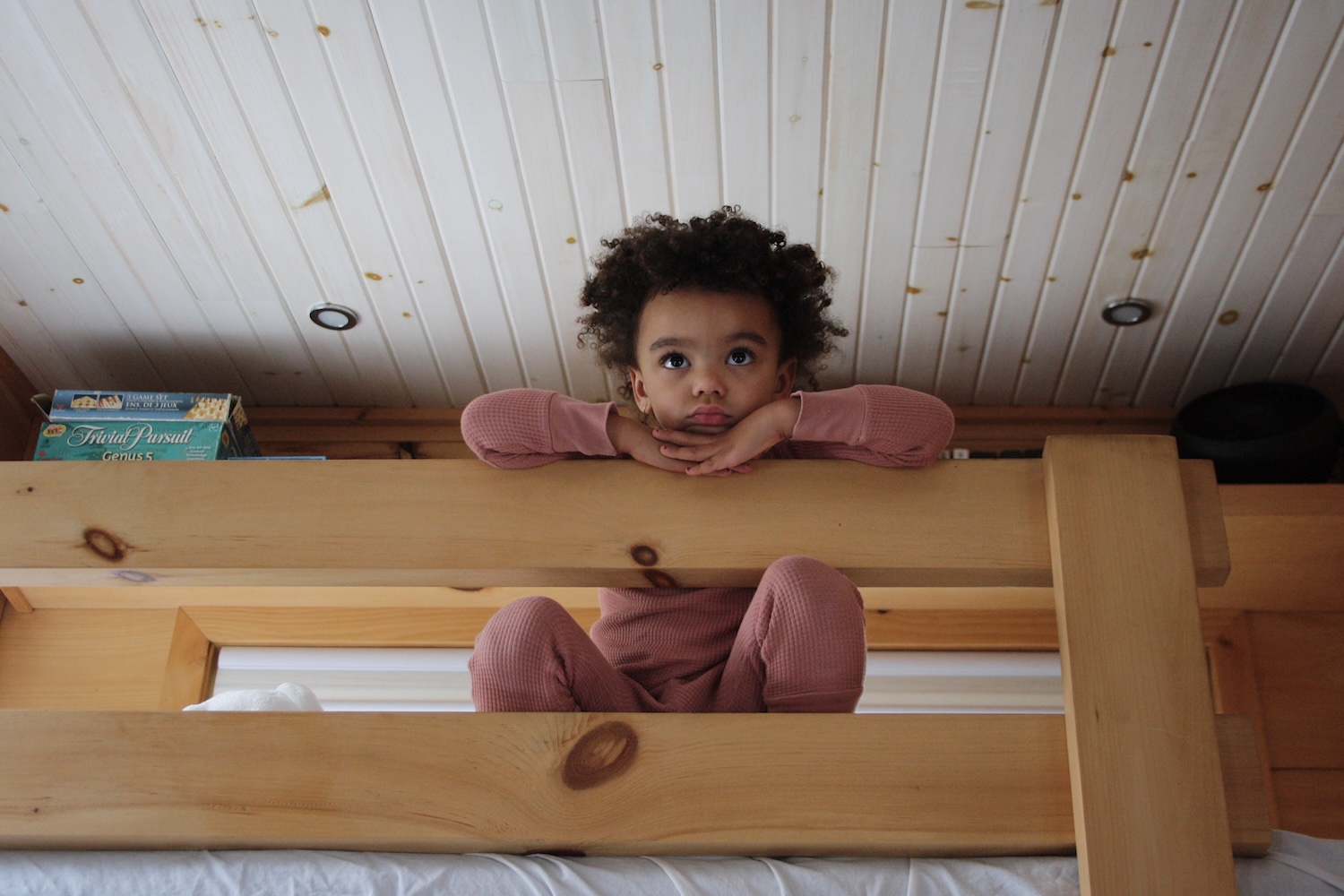 Child on Cabin Bunk Bed